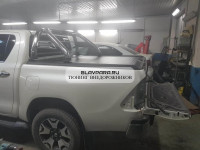 Крышка алюминиевая роллетная с дугой M2 (нерж. сталь) для Toyota Hilux Revo 2015-2023