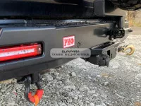 Бампер РИФ силовой задний Toyota Land Cruiser 200 2013-2015 с квадратом под фаркоп, калиткой, фонарями, подсветкой номера