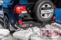 Бампер РИФ силовой задний Toyota Land Cruiser 200 2013-2015 с квадратом под фаркоп, калиткой, фонарями, подсветкой номера