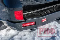 Бампер РИФ силовой задний Toyota Land Cruiser 200 2013-2015 с квадратом под фаркоп, калиткой, фонарями, подсветкой номера