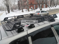 Багажник Уникар для ВАЗ-2123 Chevrolet Niva, LADA Niva Travel с боковым ограждением с сеткой на штатные места