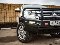 Бампер силовой передний РИФ для Mitsubishi Pajero Sport 2015+ с доп. фарами (арт. B0205), защитной дугой, защитой бачка омывателя, под парктроник