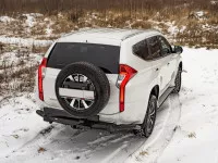 Бампер РИФ задний силовой/защита штатного бампера Mitsubishi Pajero Sport 2015-2020 c квадратом под фаркоп, калиткой, подсветкой номера Бампер РИФ задний силовой/защита штатного бампера Mitsubishi Pajero Sport 2015-2020 c квадратом под фаркоп, калиткой, подсветкой номера