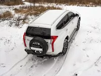 Бампер РИФ задний силовой/защита штатного бампера Mitsubishi Pajero Sport 2015-2020 c квадратом под фаркоп, калиткой, подсветкой номера Бампер РИФ задний силовой/защита штатного бампера Mitsubishi Pajero Sport 2015-2020 c квадратом под фаркоп, калиткой, подсветкой номера