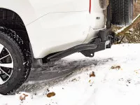 Бампер РИФ задний силовой/защита штатного бампера Mitsubishi Pajero Sport 2015-2020 c квадратом под фаркоп, калиткой, подсветкой номера Бампер РИФ задний силовой/защита штатного бампера Mitsubishi Pajero Sport 2015-2020 c квадратом под фаркоп, калиткой, подсветкой номера