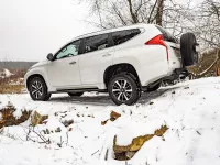 Бампер РИФ задний силовой/защита штатного бампера Mitsubishi Pajero Sport 2015-2020 c квадратом под фаркоп, калиткой, подсветкой номера Бампер РИФ задний силовой/защита штатного бампера Mitsubishi Pajero Sport 2015-2020 c квадратом под фаркоп, калиткой, подсветкой номера