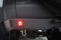 Бампер силовой задний STC для Mitsubishi Pajero Sport 2008-2015 c квадратом под фаркоп, кронштейном крепления запасного колеса и фарами